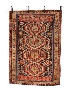 Lot 330 - A Kazak wool rug