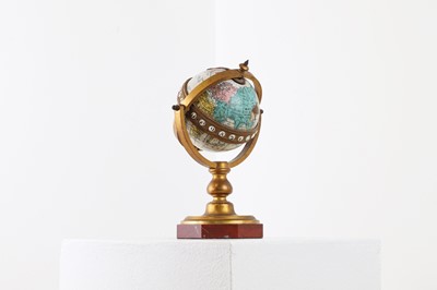 Lot 202 - An enamelled brass globe clock