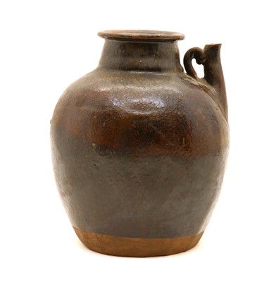 Lot 142 - A Chinese earthenware glazed water vessel