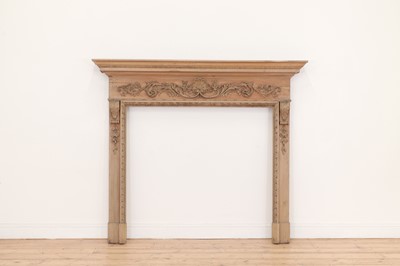 Lot 52 - A George II-style carved pine fire surround