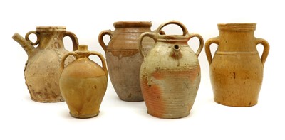 Lot 148 - Five earthenware and stoneware ewers and vessels