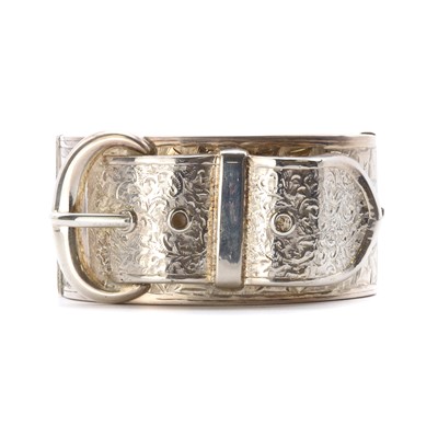 Lot 1024 - A sterling silver buckle bangle