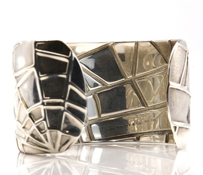 Lot 323 - A sterling silver and 18ct gold 'spider cuff' bangle, by Tiffany & Co. Ltd