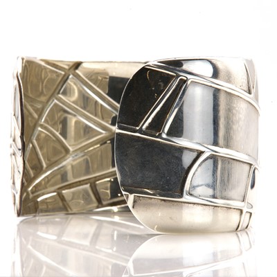 Lot 323 - A sterling silver and 18ct gold 'spider cuff' bangle, by Tiffany & Co. Ltd