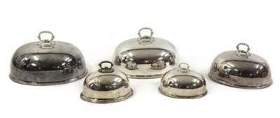 Lot 86 - Five matched and graduated silver-plated oval dish covers