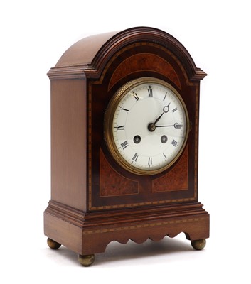 Lot 357 - An Edwardian mahogany mantel clock