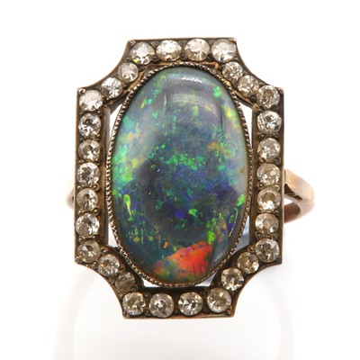 Lot 105 - An Art Deco black opal and diamond plaque ring