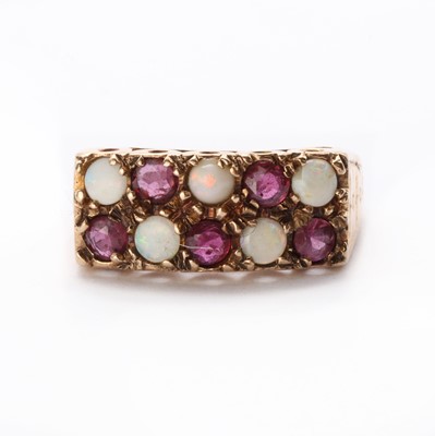 Lot 1190 - A 9ct gold two row ruby and opal ring