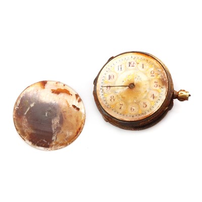 Lot 1404 - A gold open faced fob watch