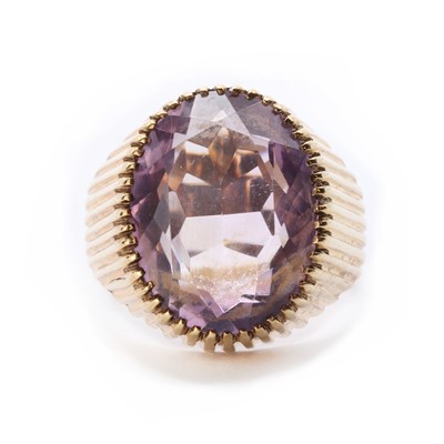 Lot 1079 - A 9ct gold single stone amethyst ring, c.1970