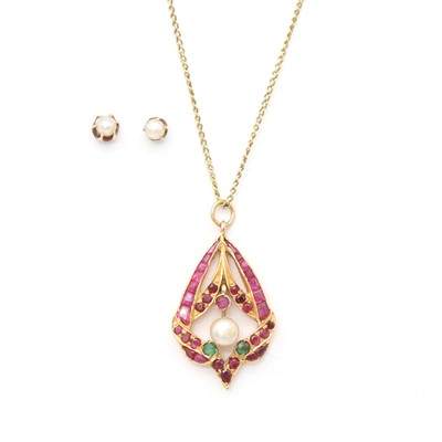 Lot 1202 - An Indian gold synthetic gemstone and pearl pendant