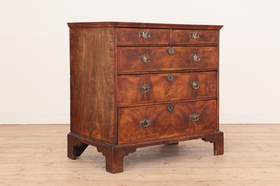 Lot 101 - A Queen Anne walnut and feather-banded chest of drawers