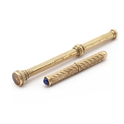 Lot 1388 - A 9ct gold propelling toothpick