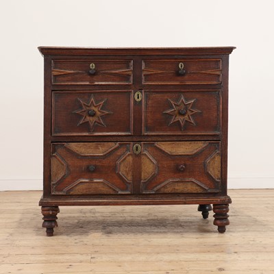 Lot 185 - An oak chest of drawers