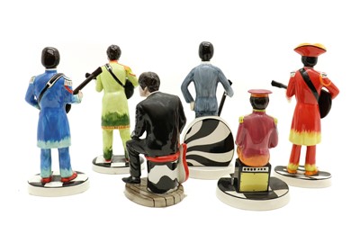Lot 98 - A group of four Lorna Bailey pottery Beatles Sgt. Pepper figures