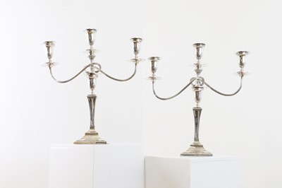 Lot 258 - A pair of silver three-light candelabra