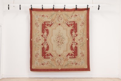 Lot 244 - A square wool rug of Aubusson design