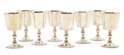 Lot 61 - A set of eight silver goblets
