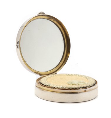 Lot 48 - A small silver compact