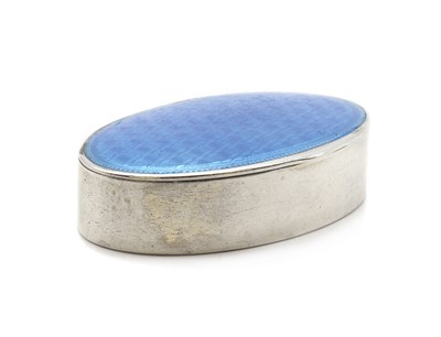 Lot 79 - An enamelled silver pill box