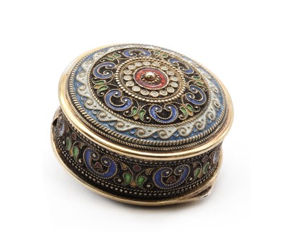 Lot 88 - A small silver gilt and enamelled snuff box