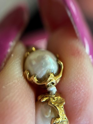Lot 178 - An 18ct gold single row cultured pearl 'Wrapped' necklace, by Charles de Temple