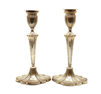 Lot 47 - A pair of silver candlesticks