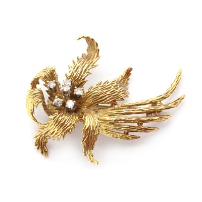 Lot 1093 - A gold diamond set spray brooch, c.1970