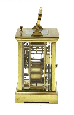 Lot 210 - A brass case carriage clock