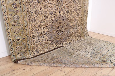 Lot 328 - A large Kashan carpet