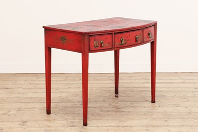 Lot 243 - A George III red japanned bow-front side table