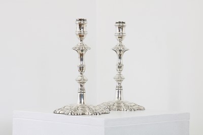 Lot 87 - A pair of George II silver table candlesticks