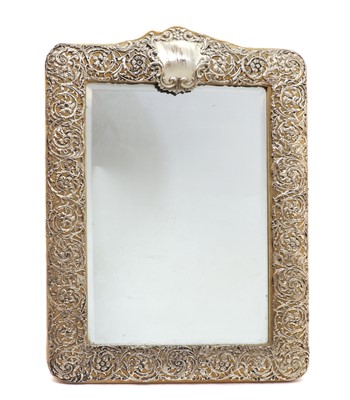 Lot 31 - A large silver mounted mirror