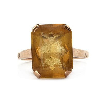 Lot 1215 - A gold single stone citrine ring