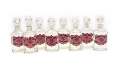 Lot 405 - A set of eight glass bottles and stoppers