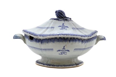 Lot 245 - An English blue and white porcelain armorial tureen and cover