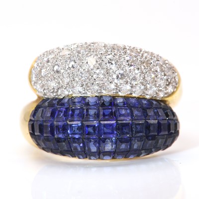 Lot 278 - A Continental sapphire and diamond bombé form crossover ring