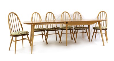Lot 380 - An Ercol dining suite