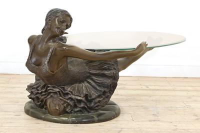 Lot 504 - A patinated bronzed resin ballerina coffee table