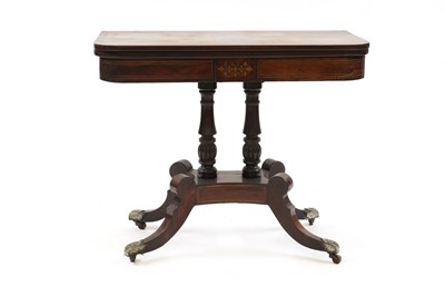 Lot 593 - A Regency rosewood and brass inlaid fold-over card table