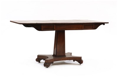 Lot 568 - A William IV Goncalo Alves sofa table in the manner of Gillow