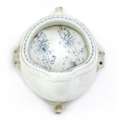 Lot 276 - An Edwardian porcelain urinal