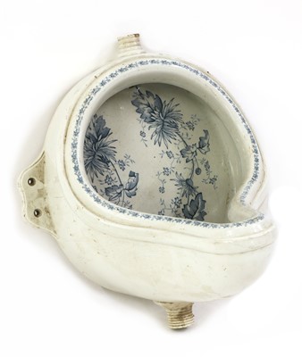 Lot 276 - An Edwardian porcelain urinal