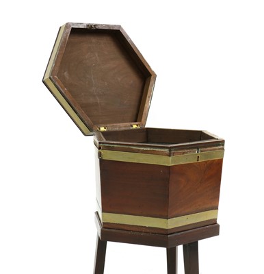 Lot 390 - A George III mahogany and brass bound hexagonal wine cooler