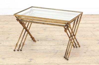 Lot 525 - A nest of three wrought iron and glass tables