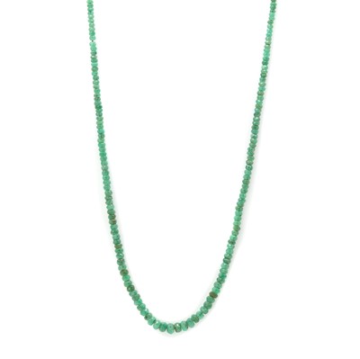 Lot 1229 - A single row graduated emerald bead necklace