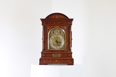 Lot 454 - An Edwardian inlaid mahogany mantel clock