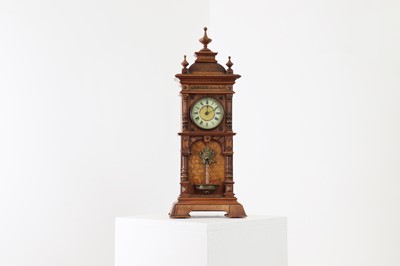 Lot 434 - An oak waterfall clock