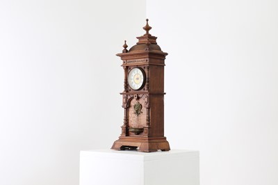 Lot 434 - An oak waterfall clock