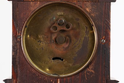 Lot 434 - An oak waterfall clock